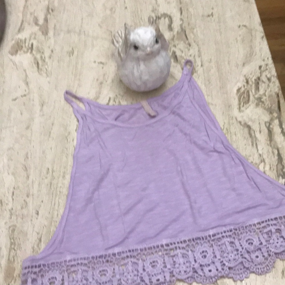 Emma and Sam-Tank top purple with lace details and open arms.